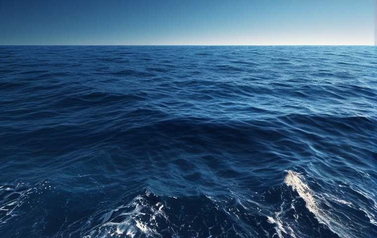 A serene ocean scene with deep blue hues, promoting calmness and peace, ideal for meditation or a relaxing desktop wallpaper.